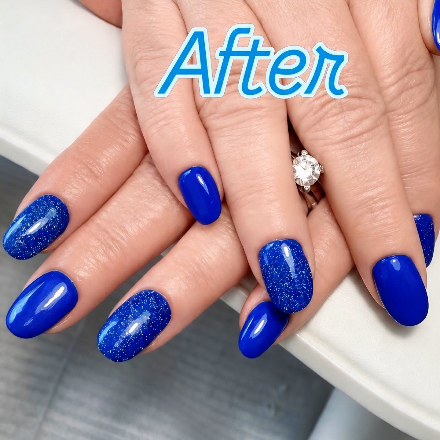 Royal blue gel manicure with glitter accent nails